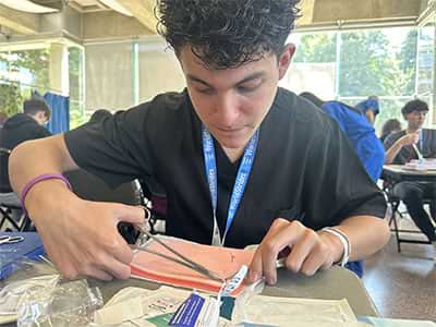 Student in suturing workshop