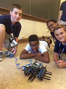 Students test their mBot robot in the Engineering pathway at NYLF Pathways to STEM