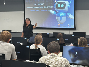 High school student engaged in an interactive workshop at Aviation Academy