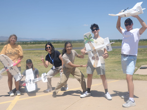 High school students testing their model aircrafts at Aviation Academy