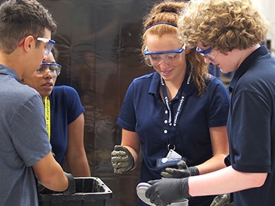 Students work together to design and test a prototype at NYLF Explore STEM Alumni