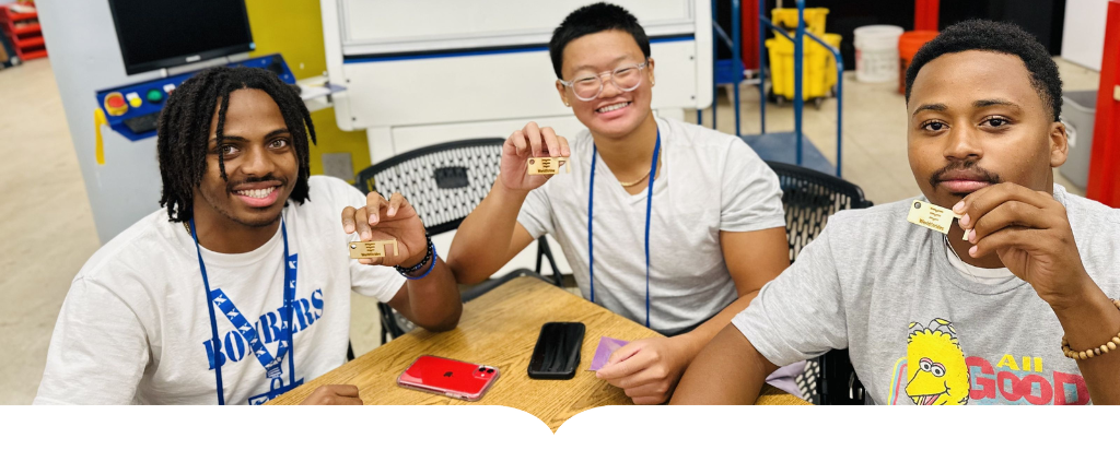 students display builds around table