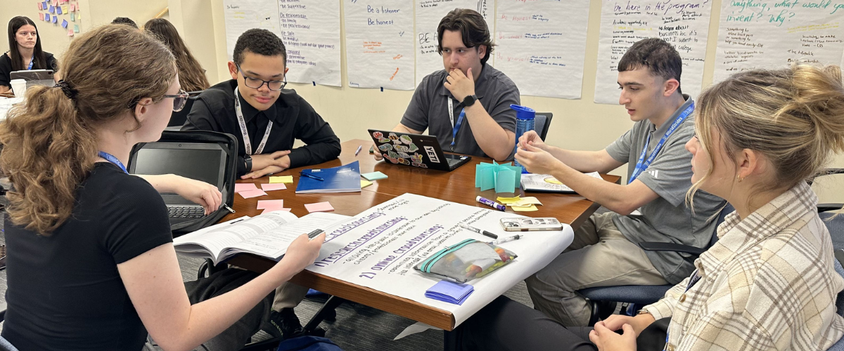 Students sitting around a table in a study group